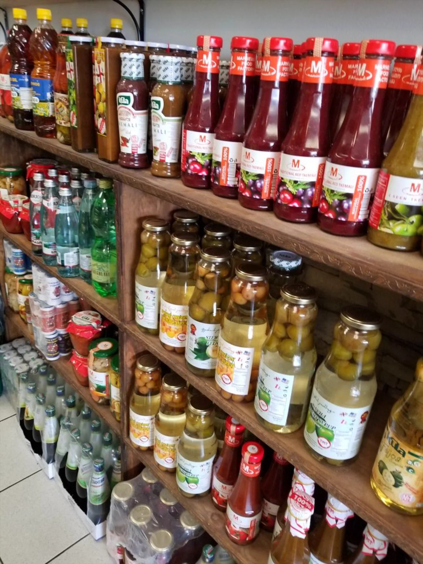Market shelves of Georgian imports, pickles and preserves